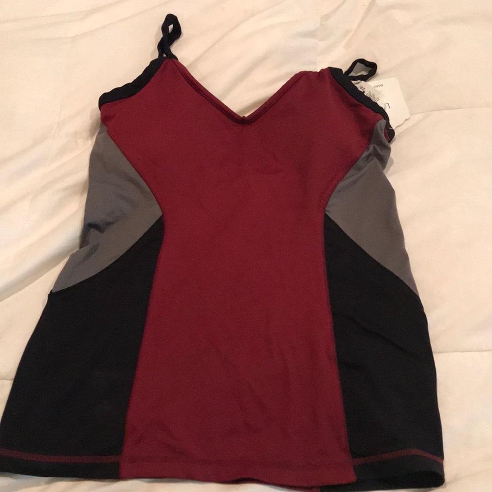 Luxury size medium workout top.